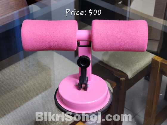 Sit-up bar with a suction cup base